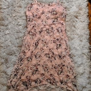 Asymmetrical floral dress with a cutout back